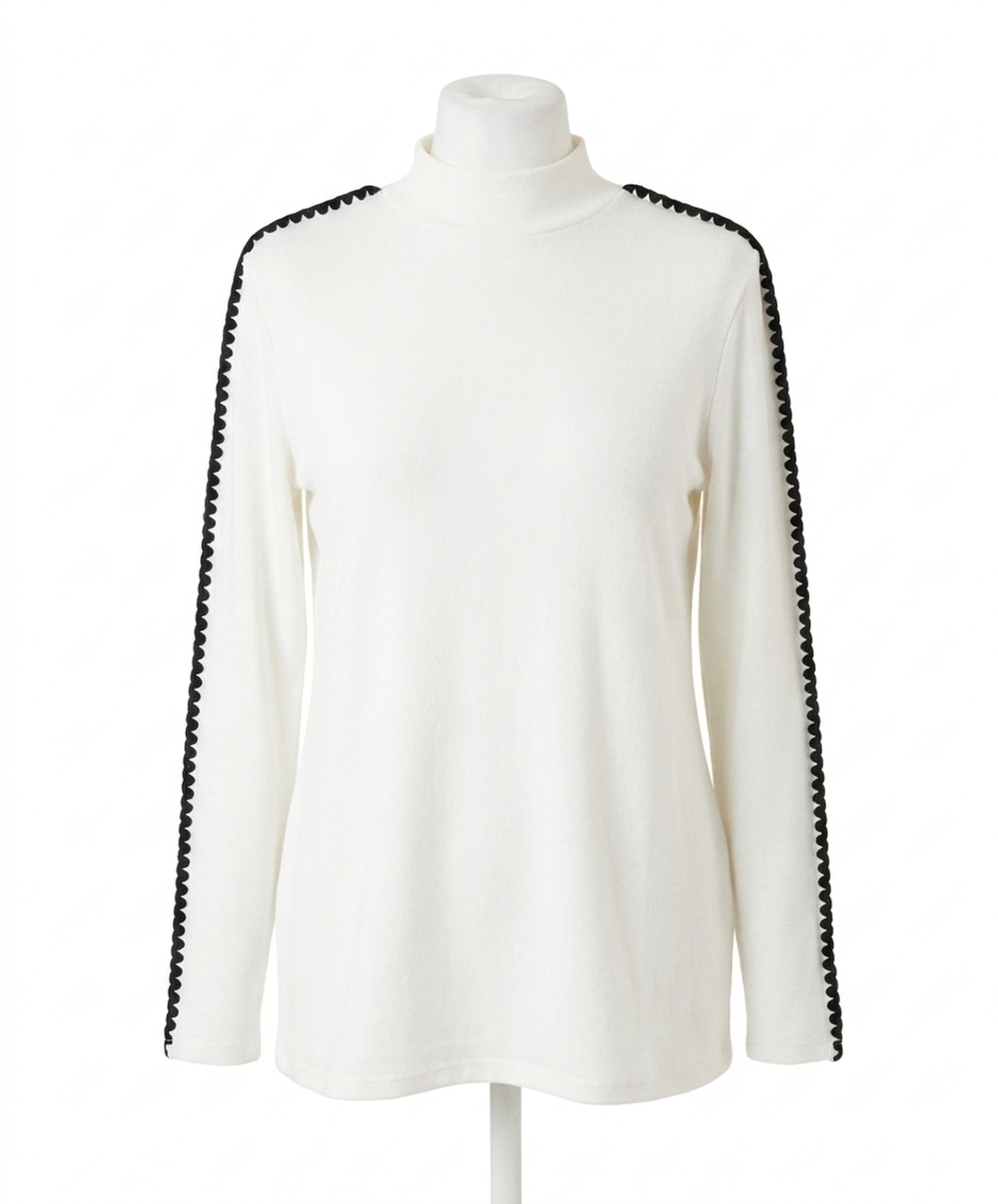 NEW FRENCH KYSS stitch sleeve mock neck sweater in ivory/black